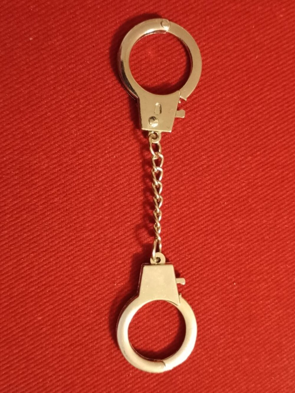 Miniature handcuffs for keyring